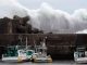 Ombak menghantam pemecah gelombang di sebuah pelabuhan di Kota Kiho, Prefektur Mie, Jepang, Jumat lalu