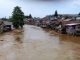 Pemukiman warga di bantaran Sungai Ciliwung usai hujan deras, Sabtu, 8 Februari 2020
