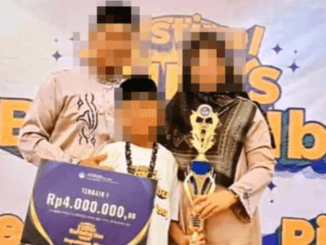 Orang tua dan JS yang memenangkan lomba tingkat provinsi. (Dok: Instagram ayah JS)